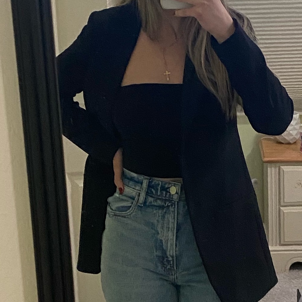 Black shoulder pad blazer